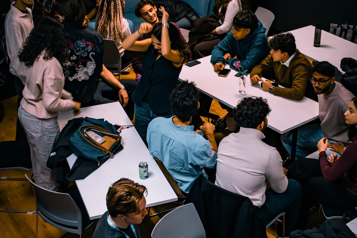 Students working around tables at an early Future Billionaires room